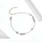 Sterling silver daisy bracelet with small flower charms and beaded chain links