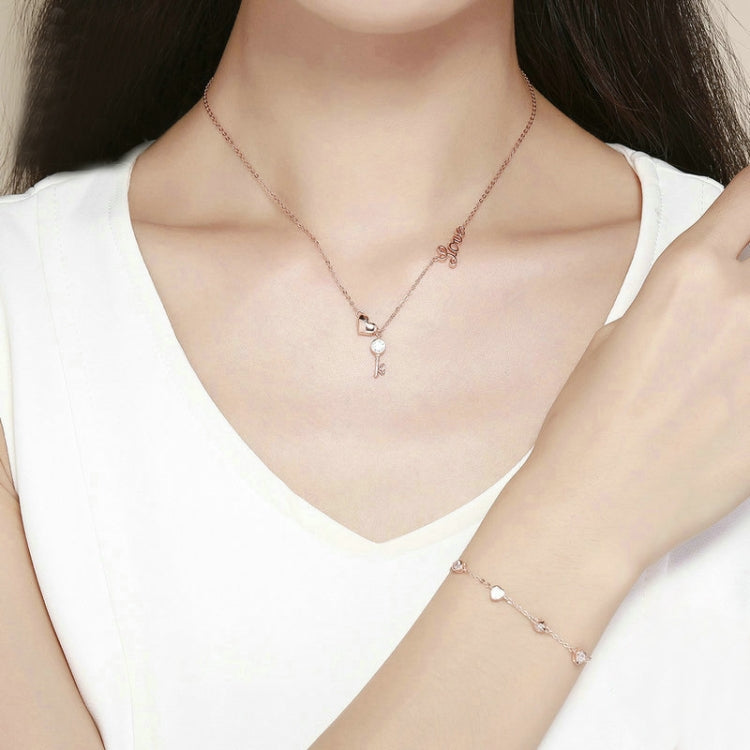 Rose gold plated zircon bracelet on wrist with small oval crystal links