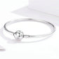 Sterling silver star bead bracelet with star ball centerpiece and bar clasp detail