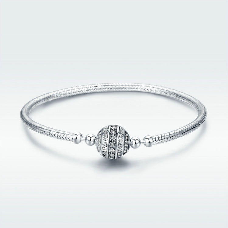 Sterling silver bangle bracelet with round paved bead and side spacer charms