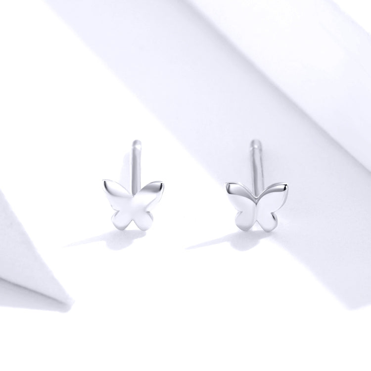 Butterfly stud earrings showing pair of silver-toned butterflies with straight post backs