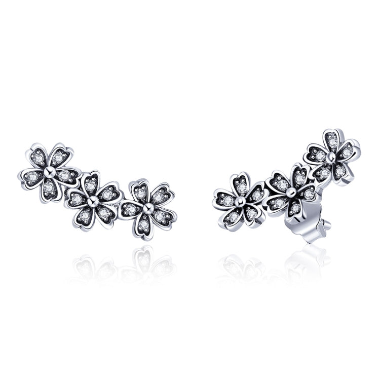 Floral zircon sterling silver stud earrings with three flower motifs