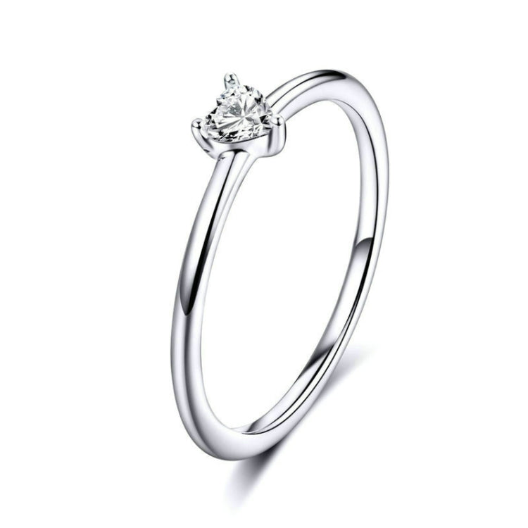 Heart-shaped clear CZ solitaire ring with slender sterling silver band