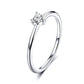 Heart-shaped clear CZ solitaire ring, front view on smooth polished band
