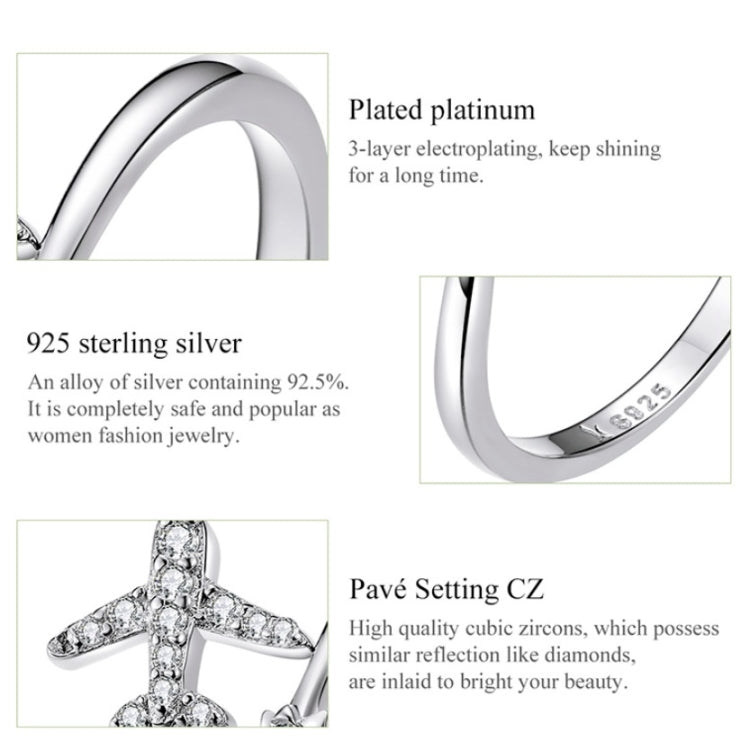 Open silver ring band with airplane zircon detail and polished interior
