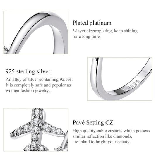 Open silver ring band with airplane zircon detail and polished interior