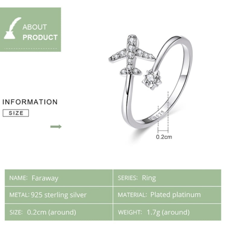 Open silver airplane zircon ring with thin band and small crossbar accents