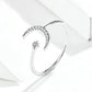Sterling silver open crescent zircon ring with small flower-like charm detail