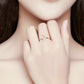 Sterling silver crescent zircon open ring on finger, small flower charm