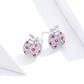 Sterling silver ladybug stud earrings with pink stones