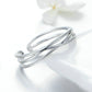 Silver open cuff-style ring with overlapping double bands and polished finish