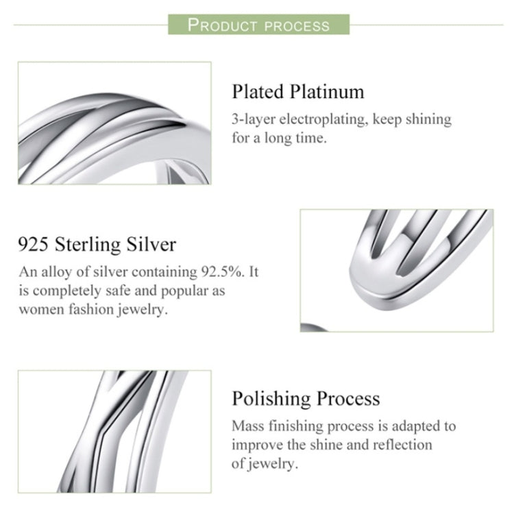Close-up of a polished silver open triple-band ring with smooth metal edges