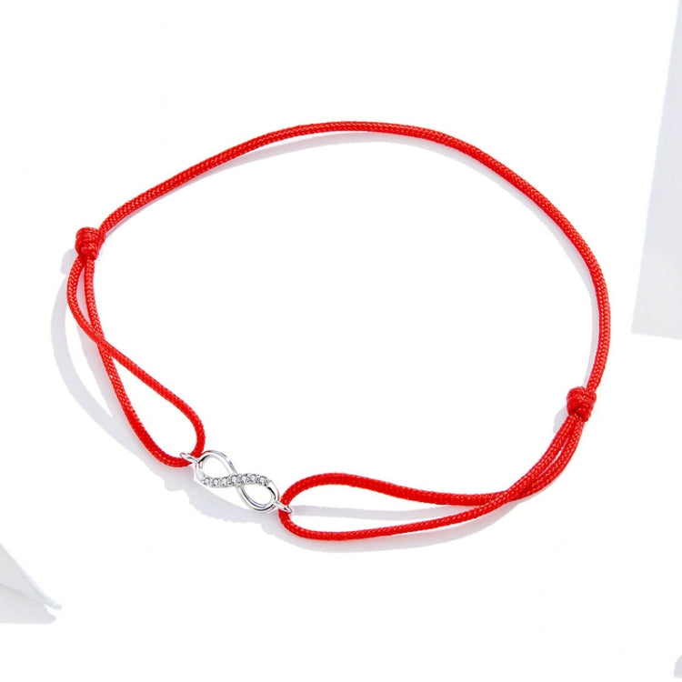 Red braided string bracelet with silver infinity clasp centerpiece and sparkle detail