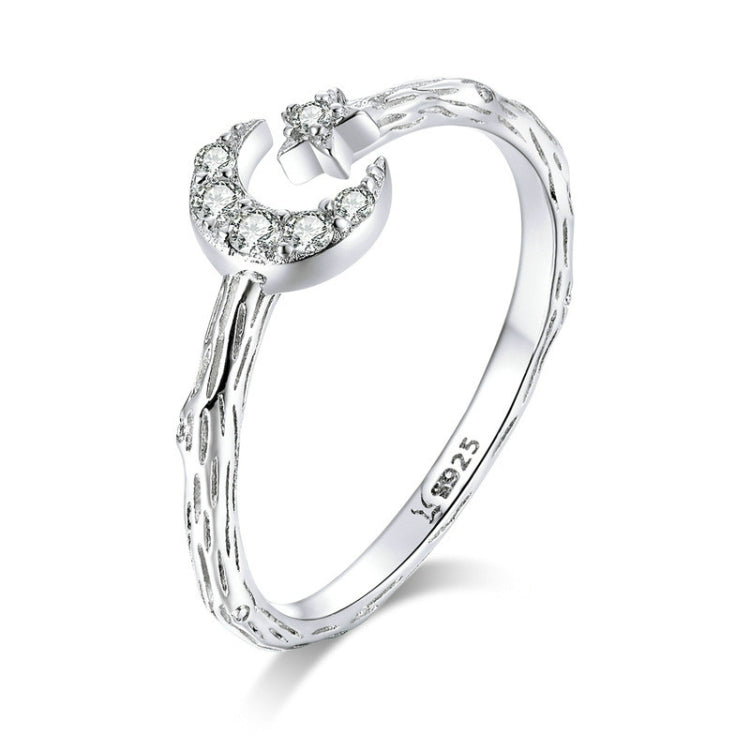 Sterling silver open ring with crescent moon, star, and clear zircon accents