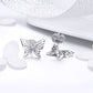 Sterling silver butterfly stud earrings with glossy wing outlines and central bow knot