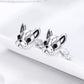 Sterling silver bulldog stud earrings, angled pair with black enamel eyes and muzzle
