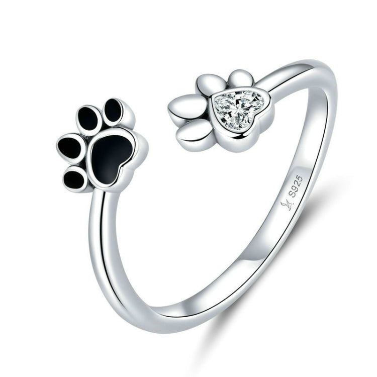 Sterling silver open ring with black paw print and clear CZ heart detail
