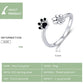 Sterling silver paw print open ring with black enamel and CZ centerpiece