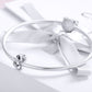 Sterling silver bracelet with star bead charm and zircon detail