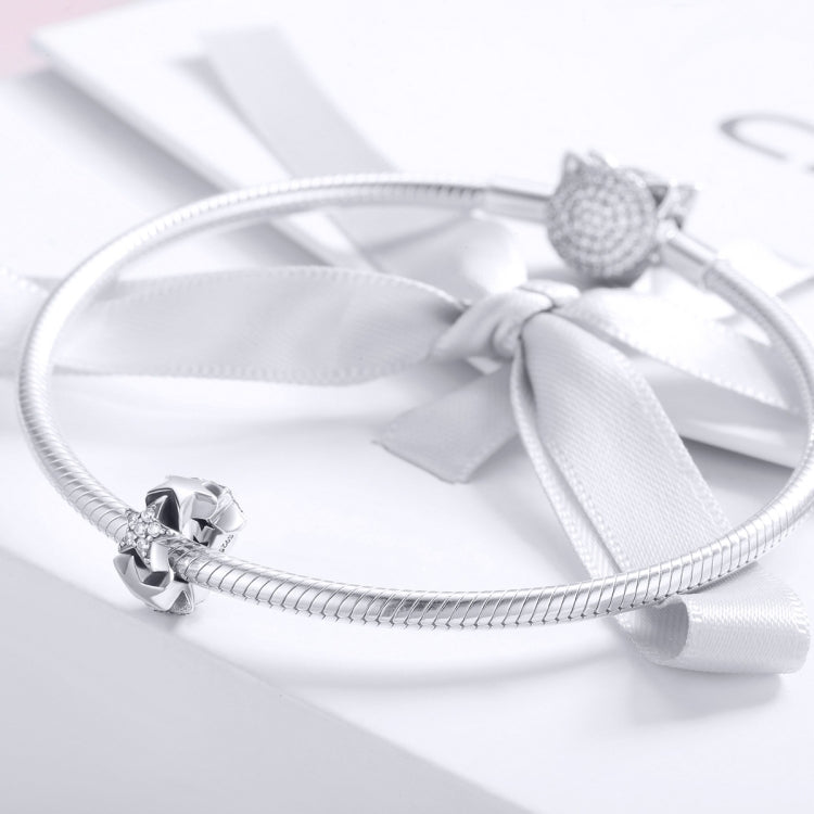 Sterling silver bracelet with star bead charm and zircon detail