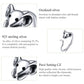 Silver mouse open ring seen from above, showing face and tail loops