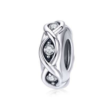 Sterling silver zircon bead charm with oval cutout design and three clear stones