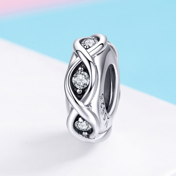 Sterling silver zircon bead charm with oval frame and three clear cubic stones
