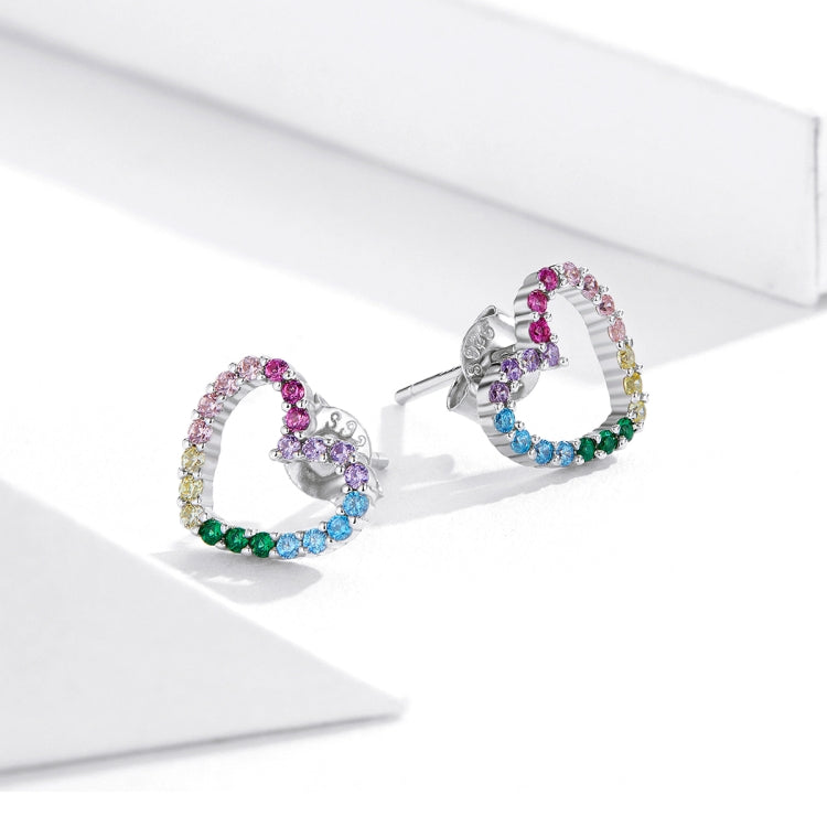 Heart-shaped rainbow CZ stud earrings with silver backs and multicolored stones