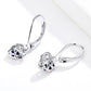 Sterling silver hollow heart earrings with blue accents
