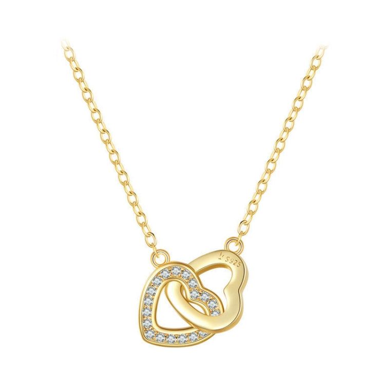 Gold sterling silver necklace with interlocking heart pendant and clear stones