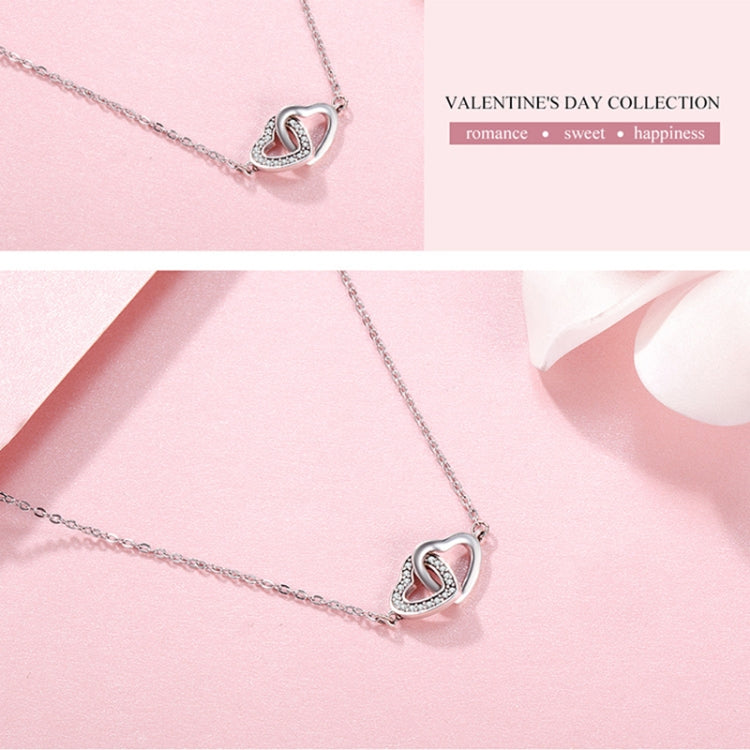 Sterling silver heart pendant necklace with interlocking hearts