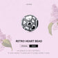 Sterling silver retro heart bead charm with heart motifs and speckled dot inlay