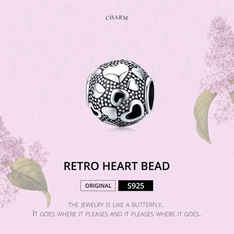 Sterling silver retro heart bead charm with heart motifs and speckled dot inlay