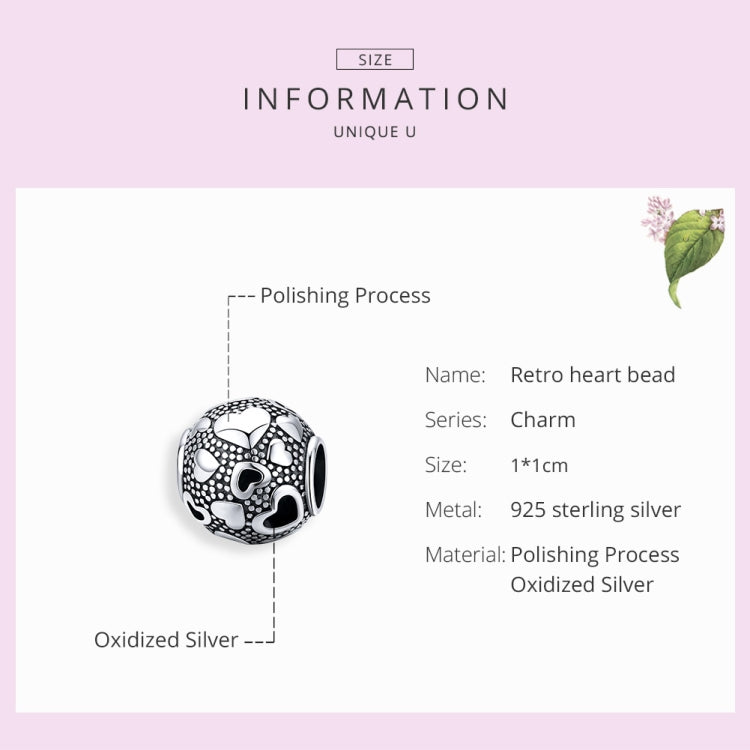 Sterling silver retro heart bead charm with black-and-white enamel heart details