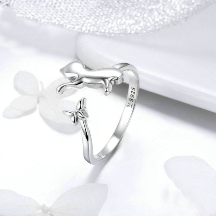 Sterling silver cat companion ring with bow charm details and 925 mark on band