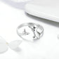 Sterling silver cat-shaped ring with bow charms; 925 stamp visible inside band