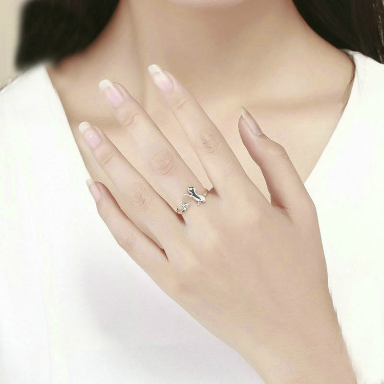 Cat companion sterling silver ring worn on hand with bow charm detail