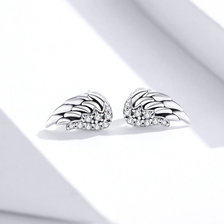 Sterling silver wing stud earrings with pavé crystal accents, pair