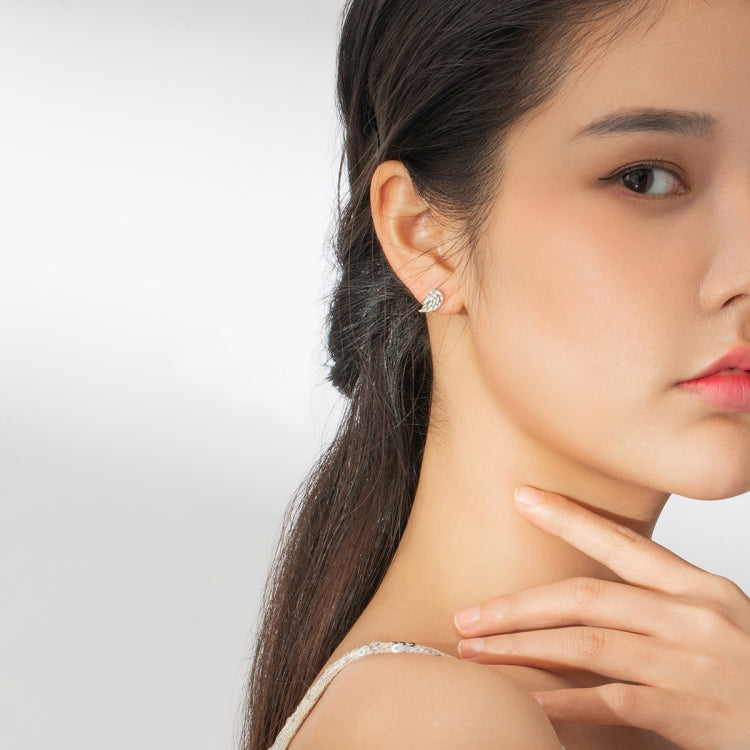 S925 sterling silver wing stud earrings on a model