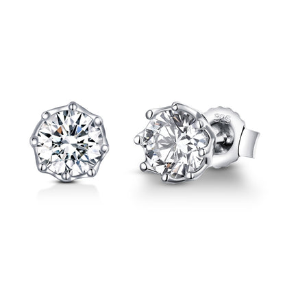 Sterling silver stud earrings with round clear zircon crystal in prong setting