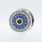 Round evil-eye charm bead in S925 silver, blue crystal ring, clear accents, black core