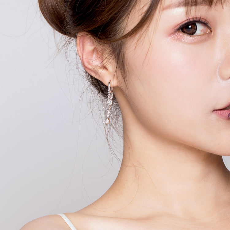 Sterling silver zircon tassel long earring on model's ear