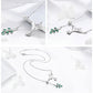 Sterling silver hummingbird necklace with green enamel flower charm and clasp