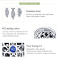 Sterling silver dreamcatcher bead charm detail with blue CZ and feather dangles