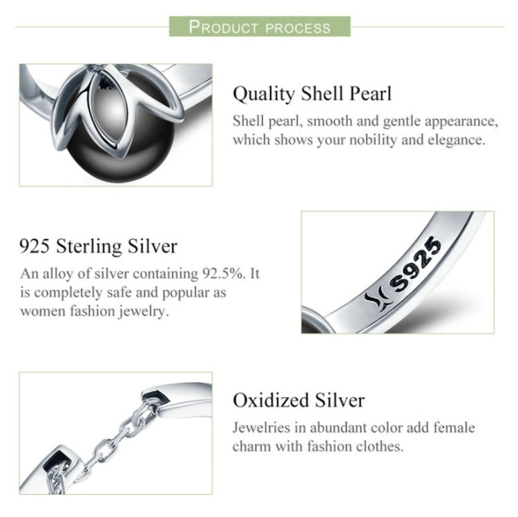 Sterling silver open ring design with black pearl charm and chain detail