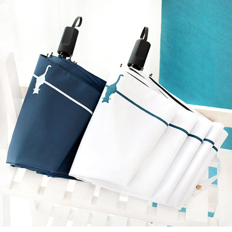 Folding umbrella set on stand: navy and white designs with cat stripe and black handles