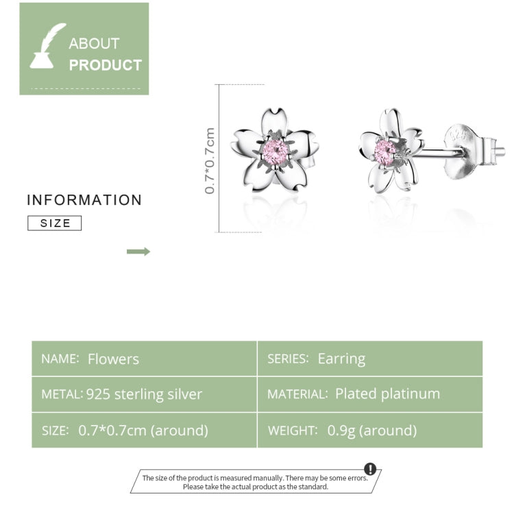 Sterling silver flower stud earrings, pink zircon center with polished petal details