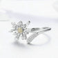 Silver dandelion flower ring with yellow center and clear CZ stones plus matching band