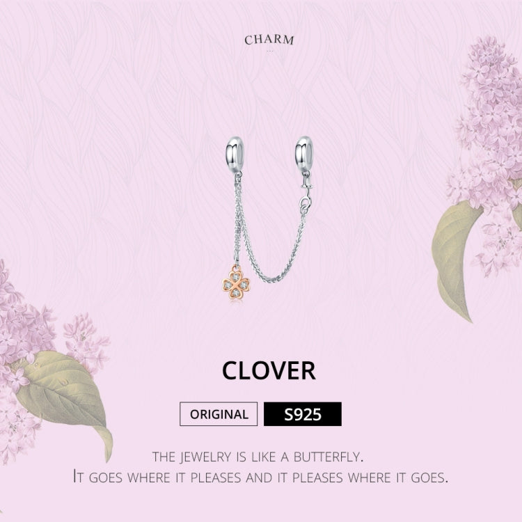 Clover charm bracelet safety chain with plated metal and gold-tone clover detail