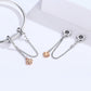 Platinum-plated safety chain bracelet with clover charm and round clasp loops